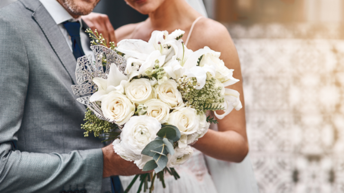 a person holding a flower